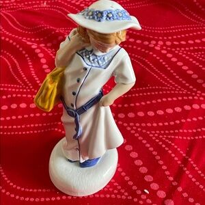 Royal Doulton Figurine with Blue and Yellow Accents childhood days